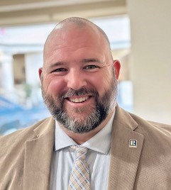 TJ Dawkins, licensed real estate agent at Ketcham Realty, specializing in North Florida properties.